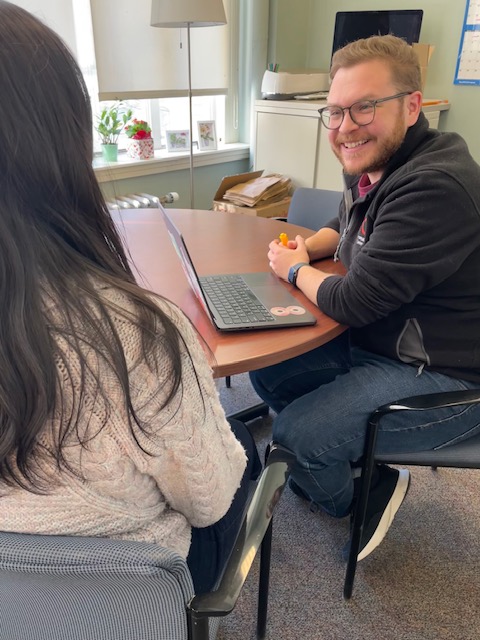 UAC Advisor Michael Santoro advising a student